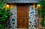 Wooden Door In The Evening Stock Photo