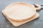 Wooden Plate On Gray Background Stock Photo