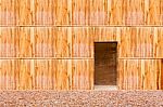 Wooden Wall With Door And Stone Floor In Front Off Stock Photo