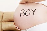 Word Boy Written On Pregnant Belly Stock Photo