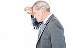 Worried Businessman Leaning Head On Wall Stock Photo