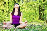 Yoga Relaxation In Forest Stock Photo