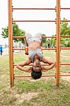 Young African Woman Doing Sit-ups Stock Photo