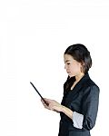 Young Asian Woman Using Tablet Computer Stock Photo