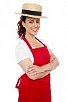 Young Baker Lady Wearing Straw Hat Stock Photo