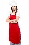 Young Baker Woman With Folded Arms Stock Photo