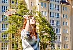 Young Beautiful Woman Playing Badminton Stock Photo