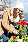 Young Beautiful Woman Shopping In A Market Stock Photo