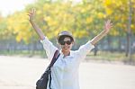 Young Beautiful Woman Wearing White Shirts ,straw Hat And Sun Gl Stock Photo