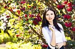 Young Beautiful Woman With Long Straight Dark Hair Posing In Spr Stock Photo