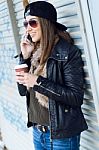 Young Beautiful Woman With Mobile Phone And Coffee Stock Photo