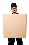 Young Boy Delivering Parcel Stock Photo
