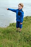 Young Boy Pointing Stock Photo