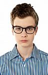 Young Boy Wearing Glasses Stock Photo