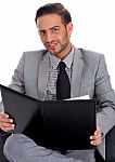 Young Business Man Holding A Clipboard Stock Photo