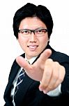 Young Business Man Pointing At Stock Photo