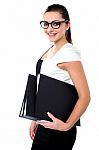 Young Business Professional Posing With Folders Stock Photo