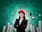 Young Business Woman Has Many Ideas On Business Background Stock Photo