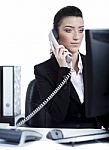 Young Business Woman Making A Phone Call At Office Stock Photo