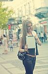Young Business Woman With Tablet Computer Walking In Public Spac Stock Photo