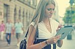 Young Business Woman With Tablet Computer Walking On Urban Stree Stock Photo