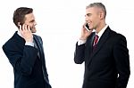 Young Businessmen With Cell Phones Stock Photo
