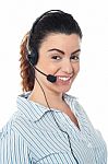 Young Call Center Woman With Headset Stock Photo