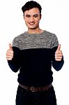 Young Casual Guy Gesturing Double Thumbs Up Stock Photo