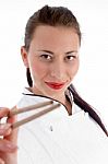 Young Chef Holding Chopsticks Stock Photo