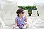 Young Child Wearing Sunglasses Stock Photo