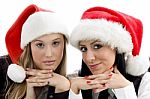 Young Colleagues Wearing Christmas Hat Stock Photo