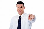 Young Corporate Guy Pointing At You Stock Photo