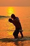 Young Couple At Sunset  Stock Photo