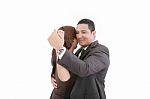 Young Couple Dancing Over White Background Stock Photo