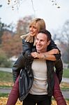 Young Couple In Park Stock Photo