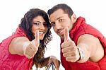 Young Couple Showing Thumb Up Stock Photo