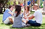 Young Couples Playing Games Stock Photo