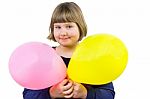 Young Dutch Girl Holding Two Balloons Stock Photo