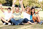 Young Family Having Fun In The Nature Stock Photo