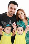 Young Family With Twin Girls Stock Photo