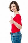 Young Fashion Woman Showing Thumbs Up Sign Stock Photo
