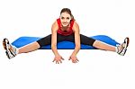 Young Fit Woman Exercising Stock Photo