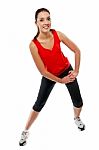 Young Fit Woman Exercising Stock Photo