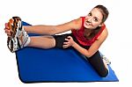 Young Fit Woman Exercising Stock Photo