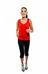 Young Fit Woman Jogging Stock Photo