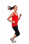 Young Fit Woman Jogging Stock Photo