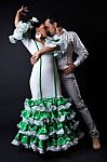 Young Flamenco Dancers In Beautiful Dress On Black Background Stock Photo