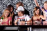 Young Friends Having Fun In Bar Stock Photo