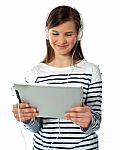 Young Girl Enjoys Listening Music Stock Photo
