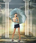 Young girl holding blue umbrella Stock Photo